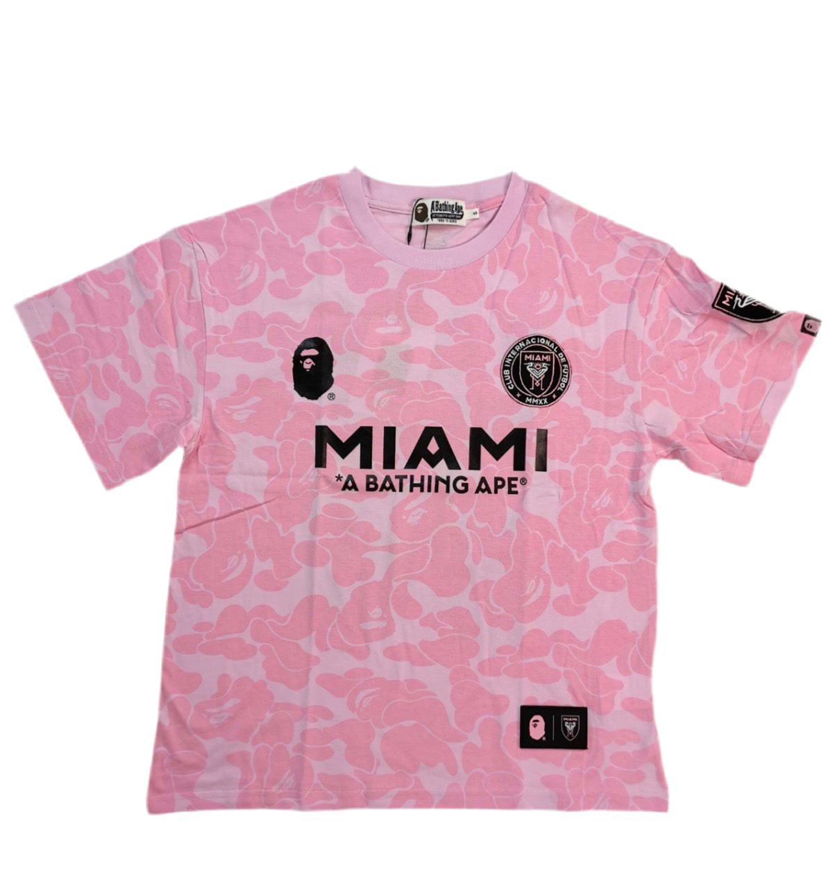 Pink t-shirt with 'MIAMI' and 'A Bathing Ape' logos on a white background