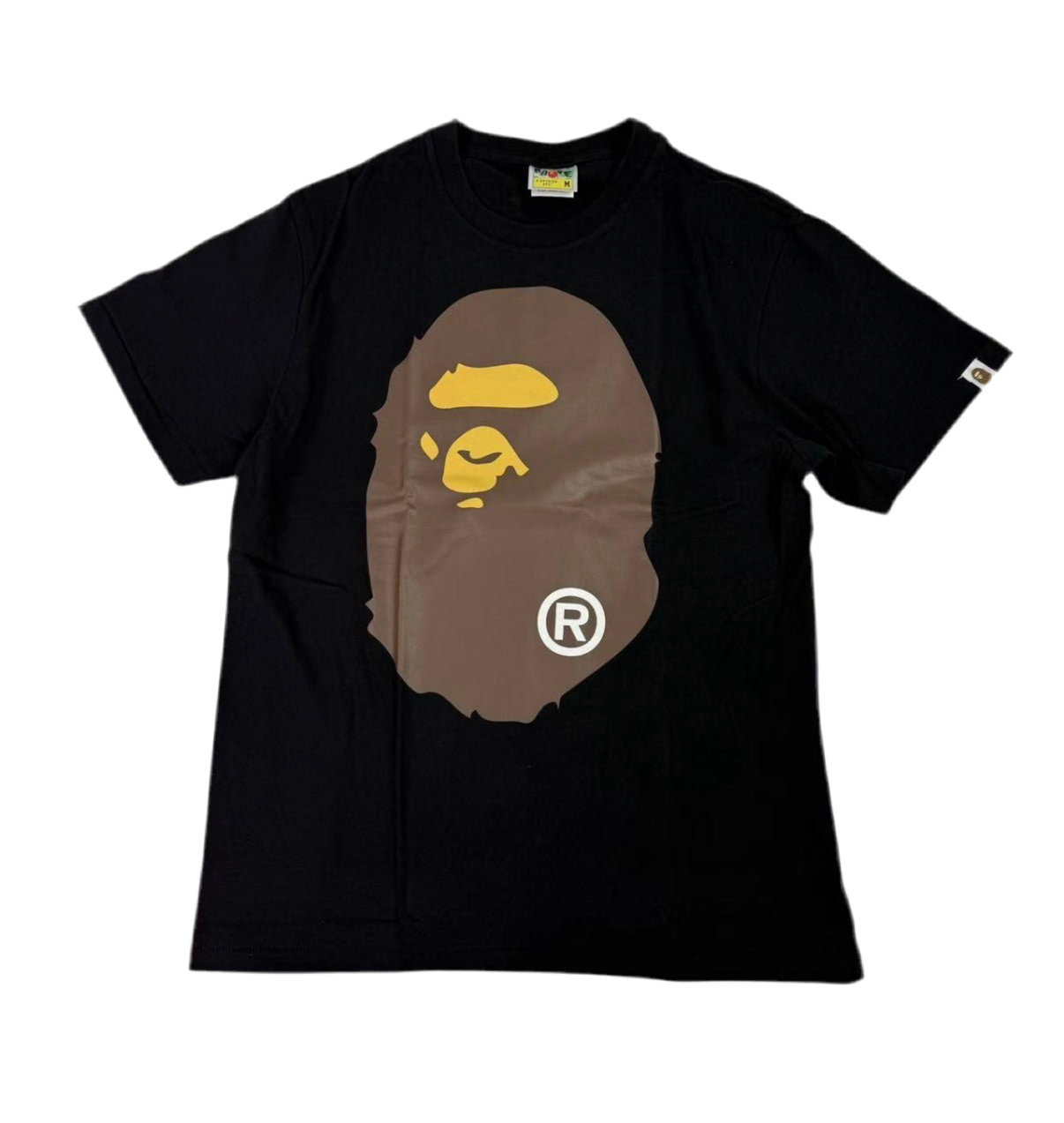 Black t-shirt with a graphic of a bear face and logo on a white background