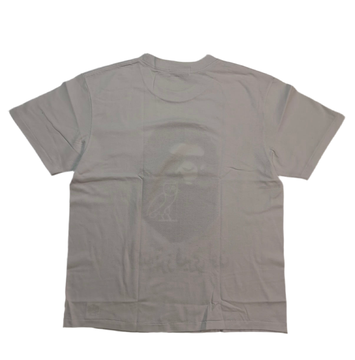 Gray t-shirt with a logo on the back against a white background