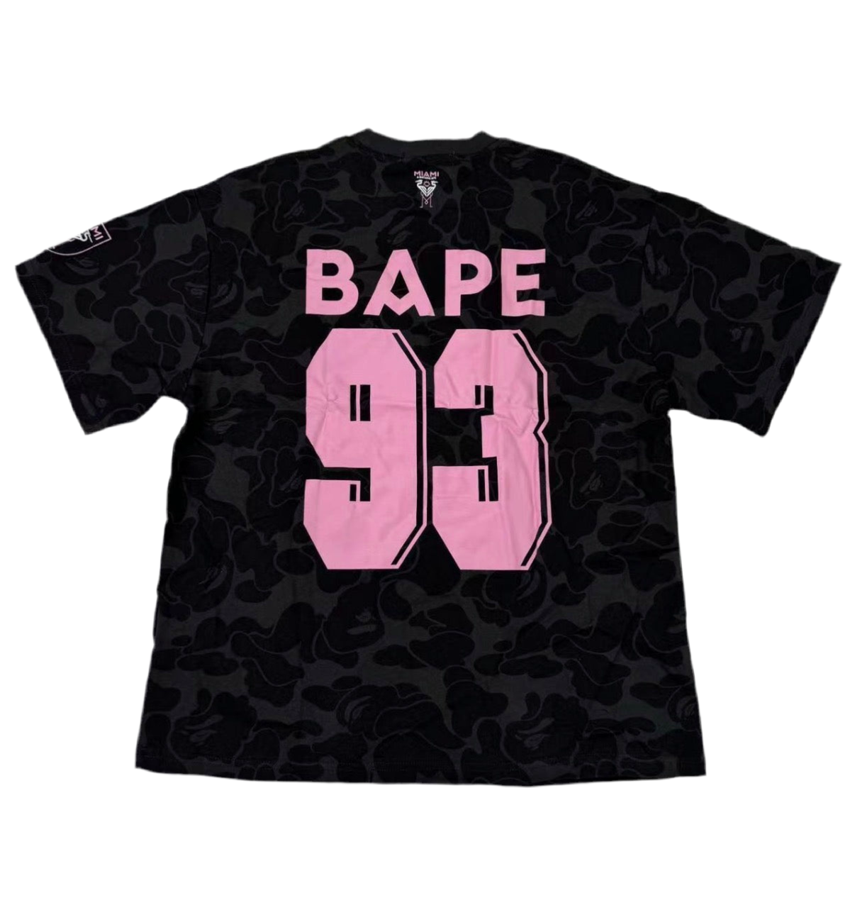 Black t-shirt with pink 'BAPE 93' logo on a white background