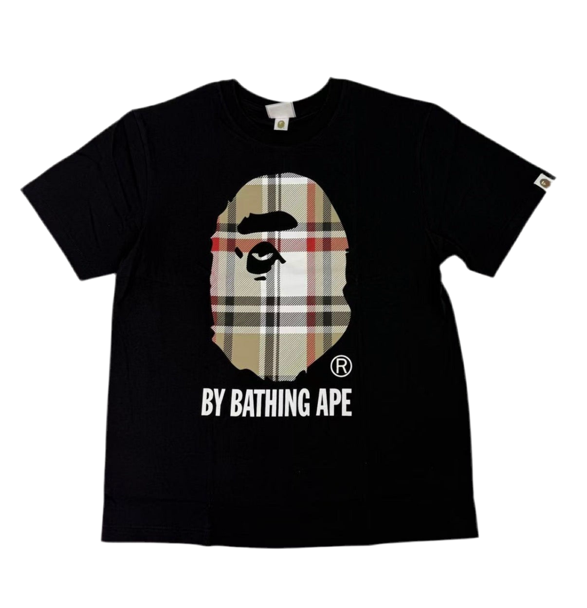 Black t-shirt with a graphic of a bear face in plaid pattern and 'By Bathing Ape' text on a white background